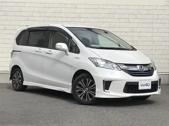 ホンダ フリード ハイブリット ジャストセレクション 栃木県 2015(平27)年 8.3万km ホワイトオーキッドパール 株)IDOMが運営する【じしゃロン小山店】の自社ローン専用車両になります。こちらは現金またはオートローンご利用時の価格です。自社ローンご希望の方は別途その旨お申付け下さい//禁煙車/純正フルセグナビ/（CD/DVD/AM/FMラジオ）/(Bluetooth)/スマートキー/バックカメラ/クルーズコントロール/ＥＴＣ/パワースライドドア/ステアリングリモコン/電動格納ドアミラー/パワーウインドウ/防眩ミラー/オートライト