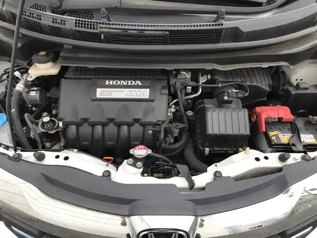 ホンダ フリード ハイブリット ジャストセレクション 栃木県 2015(平27)年 8.3万km ホワイトオーキッドパール 株)IDOMが運営する【じしゃロン小山店】の自社ローン専用車両になります。こちらは現金またはオートローンご利用時の価格です。自社ローンご希望の方は別途その旨お申付け下さい//禁煙車/純正フルセグナビ/（CD/DVD/AM/FMラジオ）/(Bluetooth)/スマートキー/バックカメラ/クルーズコントロール/ＥＴＣ/パワースライドドア/ステアリングリモコン/電動格納ドアミラー/パワーウインドウ/防眩ミラー/オートライト