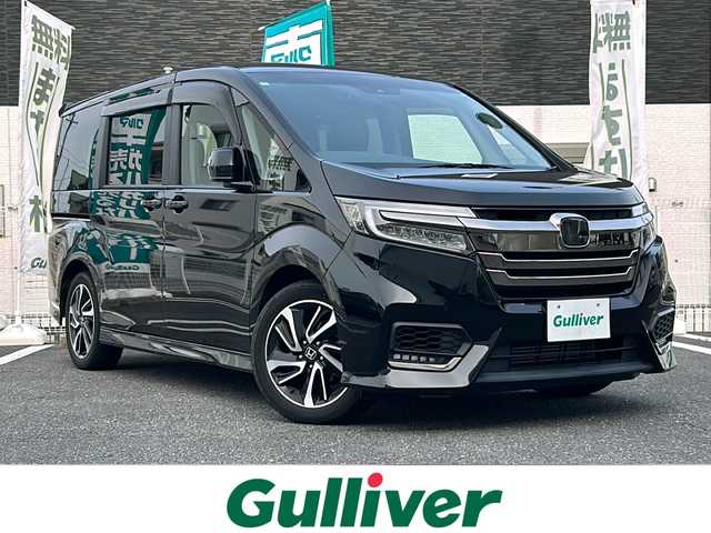 ホンダ ステップワゴン スパーダ クルスピセンシング 三重県 2021(令3)年 3.4万km プレミアムスパークルブラックパール 登録時33448km/ワンオーナー/禁煙車/ハーフレザーシート/純正Gathersナビ/（AM/FM/TV/Bluetooth/CD/DVD/USB）/フルセグTV/バックカメラ/ビルトインETC2.0/ステアリングスイッチ/パドルシフト/レーダークルーズコントロール/両側パワースライドドア/わくわくゲート/シートヒーター/オートライト/衝突軽減システム/車線逸脱防止機能/ISOFIX/アイドリングストップ/プッシュスタート/純正17インチアルミ/カーテンエアバック/スペアキー/取説/保証書