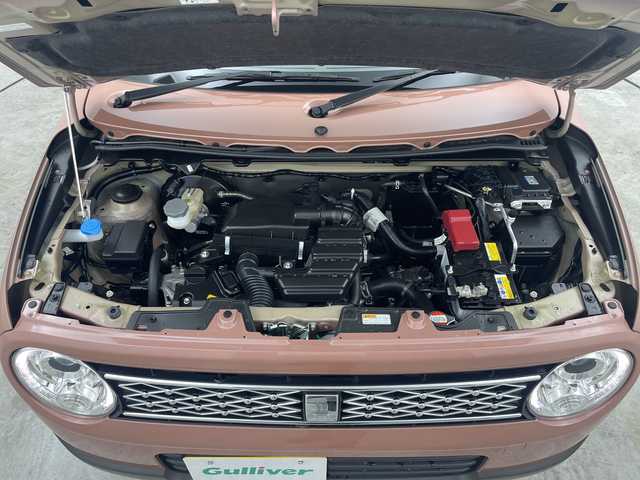 スズキ ラパン X 三重県 2024(令6)年 0.2万km テラコッタピンクメタリック 禁煙車/前席シートヒーター/全方向モニター対応/デュアルセンサーブレーキサポート/ステアリングスイッチ/レーンキープサポート/衝突軽減サポート/アイドリングストップ/プッシュスタート/スマートキー/オートライト/電動格納ミラー/スペアキー