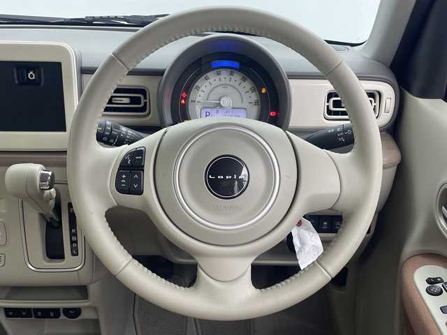 スズキ ラパン X 三重県 2024(令6)年 0.2万km テラコッタピンクメタリック 禁煙車/前席シートヒーター/全方向モニター対応/デュアルセンサーブレーキサポート/ステアリングスイッチ/レーンキープサポート/衝突軽減サポート/アイドリングストップ/プッシュスタート/スマートキー/オートライト/電動格納ミラー/スペアキー
