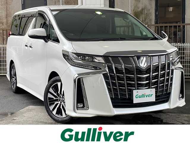 トヨタ アルファード S Cパッケージ 京都府 2018(平30)年 7.7万km ホワイトパールクリスタルシャイン 純正９インチナビ/（NSZT-Y66T）/AM/FM/CD/DVD/Bluetooth/HDMI/バックカメラ/フルセグＴＶ/レーダークルーズコントロール/純正フリップダウンモニター/（12.1インチ）/両側パワースライドドア/パワーリアゲート/三眼ＬＥＤヘッドライト/メモリー付きパワーシート/合皮シート/オットマン/前席シートヒーター/前席ベンチレーション/ステアリングヒーター/ビルトインETC/ドライブレコーダー/AFC（アダプティブフロントライティングシステム）/オートマチックハイビーム/オートライト/前後コーナーセンサー/レーンキープアシスト/ダブルエアバッグ＆サイドエアバッグ/カーテンエアバッグ/衝突被害軽減ブレーキ/純正18インチホイール/純正フロアマット/横滑り防止装置/盗難防止装置/ABS