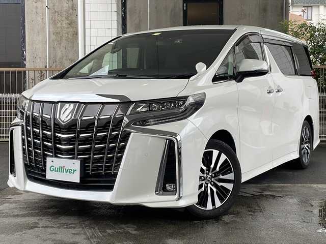 トヨタ アルファード S Cパッケージ 京都府 2018(平30)年 7.7万km ホワイトパールクリスタルシャイン 純正９インチナビ/（NSZT-Y66T）/AM/FM/CD/DVD/Bluetooth/HDMI/バックカメラ/フルセグＴＶ/レーダークルーズコントロール/純正フリップダウンモニター/（12.1インチ）/両側パワースライドドア/パワーリアゲート/三眼ＬＥＤヘッドライト/メモリー付きパワーシート/合皮シート/オットマン/前席シートヒーター/前席ベンチレーション/ステアリングヒーター/ビルトインETC/ドライブレコーダー/AFC（アダプティブフロントライティングシステム）/オートマチックハイビーム/オートライト/前後コーナーセンサー/レーンキープアシスト/ダブルエアバッグ＆サイドエアバッグ/カーテンエアバッグ/衝突被害軽減ブレーキ/純正18インチホイール/純正フロアマット/横滑り防止装置/盗難防止装置/ABS