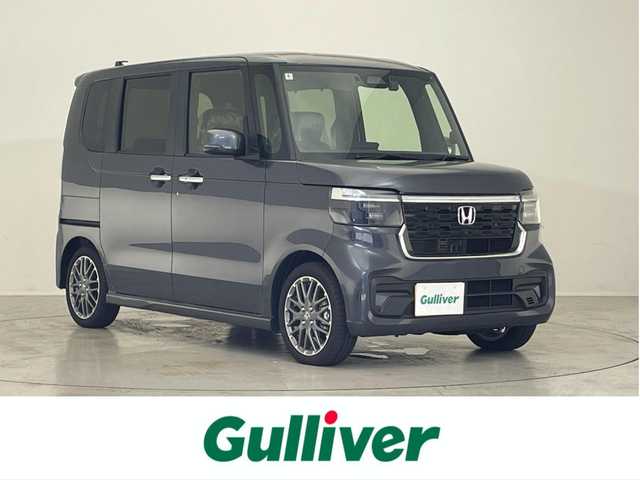 ホンダ Ｎ ＢＯＸ カスタム ターボ 滋賀県 2024(令6)年 0.1万km メテオロイドグレーメタリック 禁煙車/純正9型ナビ/CD/DVD/Bluetooth/フルセグTV/ドラレコ/ETC/バックカメラ/両側パワースライドドア/プッシュスタート/スペアキー/クルーズコントロール/ハーフレザーシート/ホンダセンシング/LEDヘッドライト/オートライト
