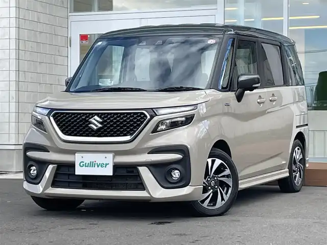 スズキ ソリオ バンディット HV MV 道央・札幌 2023(令5)年 8.3万km キャラバンアイボリーパールM / ガンメタリック2トーン ・4WD/・純正９インチナビ/(フルセグ/AM/FM/CD/DVD/BT)/・全方位カメラ/・衝突軽減ブレーキ/・純正ドライブレコーダー/・両側パワースライドドア/・D席/N席シートヒーター/・冬タイヤ　15インチ積込/・純正　15インチAW/・純正フロアマット/・アイドリングストップ/・クルーズコントロール（追従走行有）/・リアコーナーセンサー/・レーンキープアシスト/・LEDヘッドライ/・オートライト/・フォグランプ/・ポップアップディスプレイ/・盗難防止装置/・ABS/・横滑り防止装置/・スマートキー/・プッシュスタート/・スペアキー/・USB充電typeAtypeC/・後席サーキュレーター