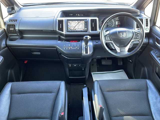 ホンダ ステップワゴン スパーダ Z クールスピリット 栃木県 2012(平24)年 8.2万km プレミアムスパークルブラックパール 純正ナビ/CD/DVD/TV/USB/ビデオ/VSA（ABS＋TCS＋横すべり抑制）+ヒルスタートアシスト機能/バックカメラ/ドライブレコーダー/ETC/アイドリングストップシステム/エコアシスト（ECONモード、コーチング機能）/クルーズコントロール/アクティブコーナリングライト/両側パワースライドドア/Hondaスマートキーシステム/盗難防止装置/スパーダ専用17インチアルミホイール/フォグライト/パドルシフト/ドアバイザー/HIDベットライト/オートライト