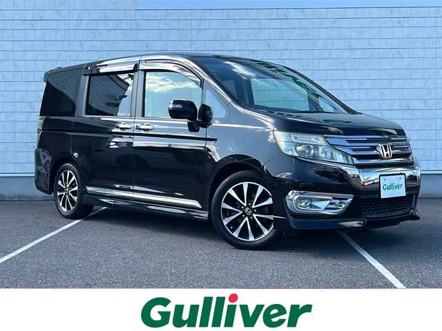 ホンダ ステップワゴン スパーダ Z クールスピリット 栃木県 2012(平24)年 8.2万km プレミアムスパークルブラックパール 純正ナビ/CD/DVD/TV/USB/ビデオ/VSA（ABS＋TCS＋横すべり抑制）+ヒルスタートアシスト機能/バックカメラ/ドライブレコーダー/ETC/アイドリングストップシステム/エコアシスト（ECONモード、コーチング機能）/クルーズコントロール/アクティブコーナリングライト/両側パワースライドドア/Hondaスマートキーシステム/盗難防止装置/スパーダ専用17インチアルミホイール/フォグライト/パドルシフト/ドアバイザー/HIDベットライト/オートライト