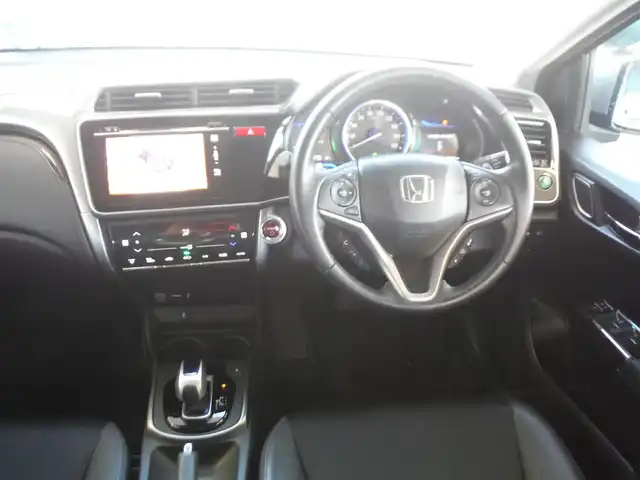 ホンダ グレイス ハイブリッド EX 東京都 2015(平27)年 7.3万km グレー ワンオーナー車/保証書あり/純正ナビ・TV/　BLUETOOTH・HDMI/　バックカメラ・ビルトインETC/ドライブレコーダー/ハーフレザーシート/　前席シートヒーター/あんしんパッケージ/パドルシフト/　クルーズコントロール/モデューロサイドスポイラー/LEDヘッドライト/電動コーナーポール/イルミスカッフプレート/スマートキー×2個