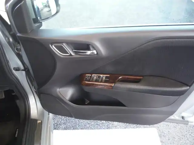 ホンダ グレイス ハイブリッド EX 東京都 2015(平27)年 7.3万km グレー ワンオーナー車/保証書あり/純正ナビ・TV/　BLUETOOTH・HDMI/　バックカメラ・ビルトインETC/ドライブレコーダー/ハーフレザーシート/　前席シートヒーター/あんしんパッケージ/パドルシフト/　クルーズコントロール/モデューロサイドスポイラー/LEDヘッドライト/電動コーナーポール/イルミスカッフプレート/スマートキー×2個