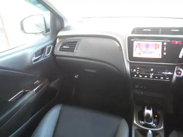 ホンダ グレイス ハイブリッド EX 東京都 2015(平27)年 7.3万km グレー ワンオーナー車/保証書あり/純正ナビ・TV/　BLUETOOTH・HDMI/　バックカメラ・ビルトインETC/ドライブレコーダー/ハーフレザーシート/　前席シートヒーター/あんしんパッケージ/パドルシフト/　クルーズコントロール/モデューロサイドスポイラー/LEDヘッドライト/電動コーナーポール/イルミスカッフプレート/スマートキー×2個