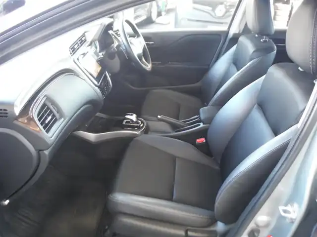 ホンダ グレイス ハイブリッド EX 東京都 2015(平27)年 7.3万km グレー ワンオーナー車/保証書あり/純正ナビ・TV/　BLUETOOTH・HDMI/　バックカメラ・ビルトインETC/ドライブレコーダー/ハーフレザーシート/　前席シートヒーター/あんしんパッケージ/パドルシフト/　クルーズコントロール/モデューロサイドスポイラー/LEDヘッドライト/電動コーナーポール/イルミスカッフプレート/スマートキー×2個