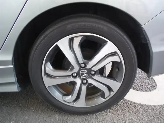 ホンダ グレイス ハイブリッド EX 東京都 2015(平27)年 7.3万km グレー ワンオーナー車/保証書あり/純正ナビ・TV/　BLUETOOTH・HDMI/　バックカメラ・ビルトインETC/ドライブレコーダー/ハーフレザーシート/　前席シートヒーター/あんしんパッケージ/パドルシフト/　クルーズコントロール/モデューロサイドスポイラー/LEDヘッドライト/電動コーナーポール/イルミスカッフプレート/スマートキー×2個