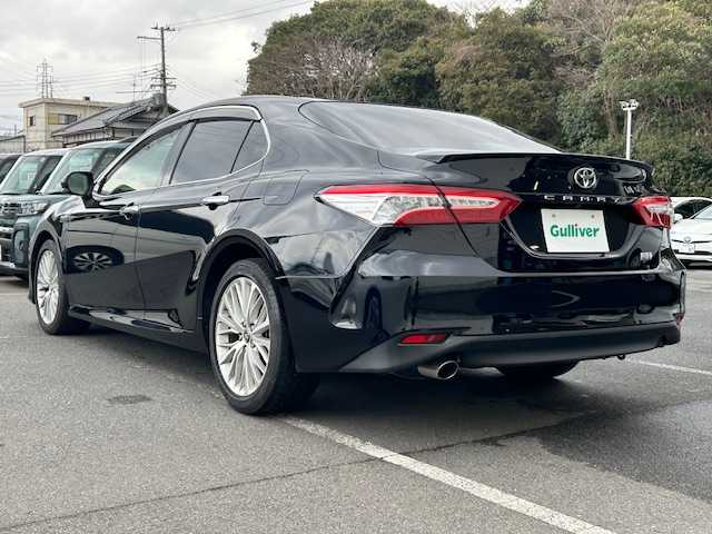 トヨタ カムリ G レザーパッケージ 大阪府 2018(平30)年 2.6万km アティチュードブラックマイカ ワンオーナー/サンルーフ/純正ナビ(BT/フルセグ/DVD)/バックカメラ/プリクラッシュセーフティー/レーンキープアシスト/アダプティブクルーズコントロール/オートマチックハイビーム/横滑り防止装置/前席シートヒーター/レザーシート/前席パワーシート/前後ドライブレコーダー/ビルトインETC/LEDヘッドライト/純正ドアバイザー/純正フロアマット/スマートキー×2