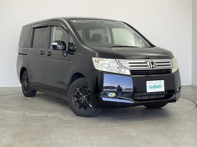ホンダ ステップワゴン G 新潟県 2010(平22)年 10.6万km クリスタルブラックパール ALPINE製メモリナビ　/バックカメラ　/社外１５インチアルミホイール　/４WD/リモコンキー