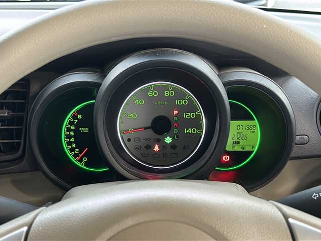 ホンダ Ｎ ＢＯＸ G Lパッケージ 愛媛県 2012(平24)年 7.2万km ヒダマリアイボリーパール 純正ナビ/バックカメラ/横滑り防止装置/スマートキー/プッシュスタート/ステアリングスイッチ