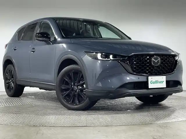 マツダ ＣＸ－５ XD ブラックトーンエディション 神奈川県 2022(令4)年 2.2万km ポリメタルグレーM ディーゼルターボ/マツダコネクトSDナビゲーション/フルセグ　Bluetooth　USB　/360度ビューカメラ/ヘッドアップディスプレイ/パワーバックドア/i-ACTIVSENSE/アドバンスドスマートシティブレーキサポート/スマートブレーキサポート/マツダレーダークルーズコントロール/AT誤発進抑制制御/車線逸脱警報システム/レーンキープアシストシステム/アダブティブLEDヘッドライト/ドライバーアテンションアラート/ブラインドスポットモニタリング/交通標識認識システム/リアクロストラフィックアラート/アイドリングストップ/前後ソナー/ハーフレザーシート/運転席パワーシート/ポジションメモリー/前席シートヒーター/革巻きステアリング/パドルシフト/ステアリングスイッチ/社外前方ドライブレコーダー/社外ETC/電動パーキングブレーキ/オートブレーキホールド/プッシュスタート/スマートキー/オートライト/フロントフォグランプ/純正19インチアルミホイール/純正リアスポイラー/取説　保証書　スペアキー