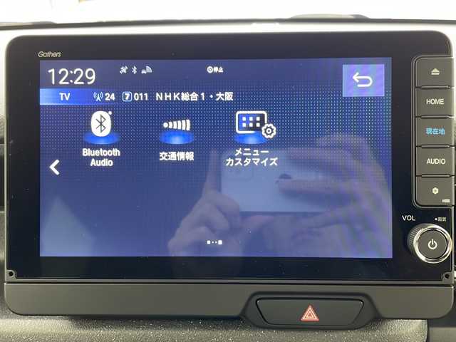 ホンダ Ｎ ＢＯＸ カスタム 大阪府 2024(令6)年 0.1万km ミッドナイトブルービームM 禁煙車/純正9型ナビ/（BT/CD/DVD/AppleCarPlay/AndroidAuto/フルセグ）/片側電動スライドドア/前方ドライブレコーダー/バックカメラ/ETC/ホンダセンシング/・衝突軽減ブレーキ（CMBS）/・誤発進抑制機能（前方・後方）/・歩行者事故低減ステアリング/・路外逸脱抑制機能/・アダプティブクルーズコントロール（ACC）/・車線維持支援システム（LKAS）/・先行車発進お知らせ機能/・標識認識機能/・オートハイビーム/電動パーキング/オートホールド/オートエアコン/USB（Type-A/Type-C）/サンシェード/オートリトラミラー/D/N席シートヒーター/スマートキー/スペアキー/オートライト/LEDヘッドライト