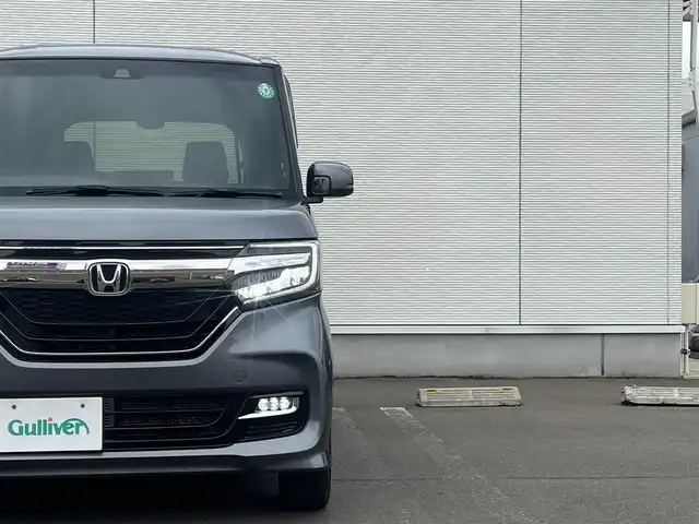 ホンダ Ｎ ＢＯＸ カスタム G L ターボ ホンダセンシング 秋田県 2019(令1)年 8.7万km シャイニンググレーM ４WD/ターボ/安全運転支援システムHondaSENSING/LEDヘッドライト/両側パワースライドドア/純正メモリナビ（DVD/CD再生可能）/フルセグ/バックカメラ/ホンダ純正１５インチアルミ（夏タイヤ装着）/スマートキー/アイドリングストップ/プッシュスタート/アダプティブ・クルーズコントロール追従走行有/コーナーセンサー/レーンキープアシスト/オートマチックハイビーム/ステアリングスイッチ/パドルシフト/前席シートヒーター/ビルトインETC/純正フロアマット/社外ドアバイザー/オートライト/オートエアコン/パワーステアリング/パワーウィンドウ/横滑り防止/盗難防止装置/寒冷地仕様/電動格納ウィンカーミラー