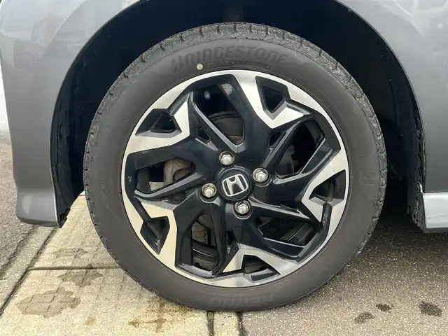 ホンダ Ｎ ＢＯＸ カスタム G L ターボ ホンダセンシング 秋田県 2019(令1)年 8.7万km シャイニンググレーM ４WD/ターボ/安全運転支援システムHondaSENSING/LEDヘッドライト/両側パワースライドドア/純正メモリナビ（DVD/CD再生可能）/フルセグ/バックカメラ/ホンダ純正１５インチアルミ（夏タイヤ装着）/スマートキー/アイドリングストップ/プッシュスタート/アダプティブ・クルーズコントロール追従走行有/コーナーセンサー/レーンキープアシスト/オートマチックハイビーム/ステアリングスイッチ/パドルシフト/前席シートヒーター/ビルトインETC/純正フロアマット/社外ドアバイザー/オートライト/オートエアコン/パワーステアリング/パワーウィンドウ/横滑り防止/盗難防止装置/寒冷地仕様/電動格納ウィンカーミラー