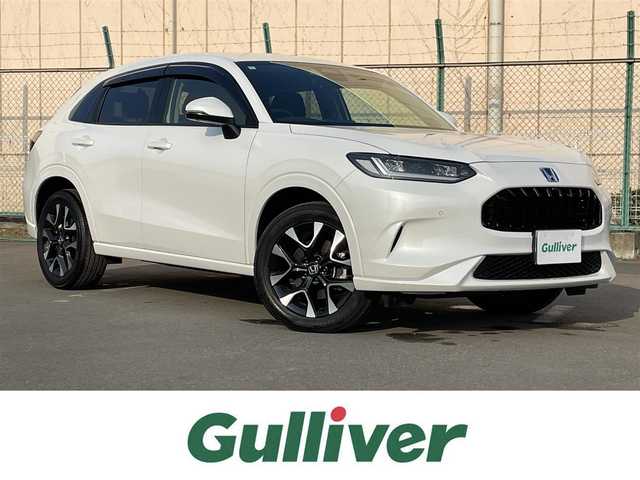 ホンダ ＺＲ－Ｖ ハイブリッド e:HEV Z 東京都 2024(令6)年 1万km プラチナホワイトパール ワンオーナー　/純正９型ナビ　/ＢＯＳＥ　/全周囲カメラ　/電動リアゲート　/レザーシート　/前席パワーシート　/シートヒーター　/ワイヤレス充電　/追従クルコン　/フルセグＴＶ　/前後ドラレコ　/ビルトイン２．０ＥＴＣ/BSＭ/パドルシフト