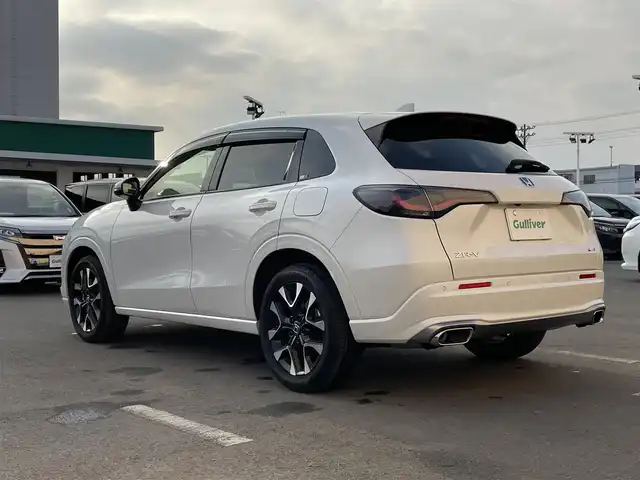 ホンダ ＺＲ－Ｖ ハイブリッド e:HEV Z 東京都 2024(令6)年 1万km プラチナホワイトパール ワンオーナー　/純正９型ナビ　/ＢＯＳＥ　/全周囲カメラ　/電動リアゲート　/レザーシート　/前席パワーシート　/シートヒーター　/ワイヤレス充電　/追従クルコン　/フルセグＴＶ　/前後ドラレコ　/ビルトイン２．０ＥＴＣ/BSＭ/パドルシフト