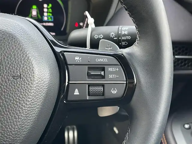 ホンダ ＺＲ－Ｖ ハイブリッド e:HEV Z 東京都 2024(令6)年 1万km プラチナホワイトパール ワンオーナー　/純正９型ナビ　/ＢＯＳＥ　/全周囲カメラ　/電動リアゲート　/レザーシート　/前席パワーシート　/シートヒーター　/ワイヤレス充電　/追従クルコン　/フルセグＴＶ　/前後ドラレコ　/ビルトイン２．０ＥＴＣ/BSＭ/パドルシフト