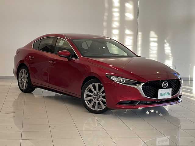 マツダ マツダ３セダン 15S ツーリング 新潟県 2021(令3)年 2.8万km ソウルレッドクリスタルM 純正SDナビ/CD/DVD/BT/フルセグテレビ/ミュージックサーバー/全方位カメラ/ETC/ドライブレコーダー/衝突被害軽減ブレーキ/レーンキープアシスト/レーダークルーズコントロール/ステアリングスイッチ/コーナーセンサー/スマートキー/プッシュスタート/LEDヘッドライト/オートライト/オートハイビーム/純正18インチアルミホイール/社外16インチAW冬タイヤ車載
