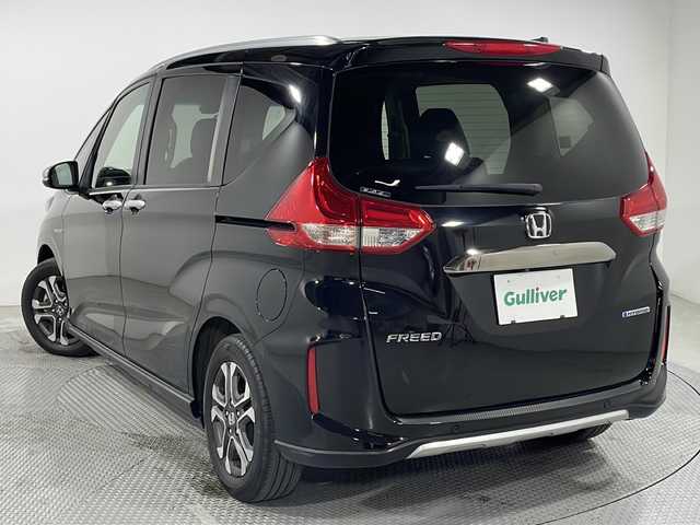 ホンダ フリード ハイブリット クロスター ホンダセンシング 広島県 2021(令3)年 3.6万km クリスタルブラックパール 禁煙車/カロッツェリアナビ/バックカメラ/レーダークルーズコントロール/両側パワースライドドア/ＥＴＣ/レーンキープアシスト/ステアリングスイッチ/衝突被害軽減システム/ＬＥＤヘッドライト/フォグ/オートライト/ＥＣＯＮ/純正15インチアルミホイール(185/65/R15)/エアバッグ(運転席/助手席)