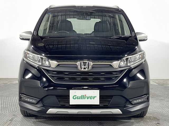 ホンダ フリード ハイブリット クロスター ホンダセンシング 広島県 2021(令3)年 3.6万km クリスタルブラックパール 禁煙車/カロッツェリアナビ/バックカメラ/レーダークルーズコントロール/両側パワースライドドア/ＥＴＣ/レーンキープアシスト/ステアリングスイッチ/衝突被害軽減システム/ＬＥＤヘッドライト/フォグ/オートライト/ＥＣＯＮ/純正15インチアルミホイール(185/65/R15)/エアバッグ(運転席/助手席)