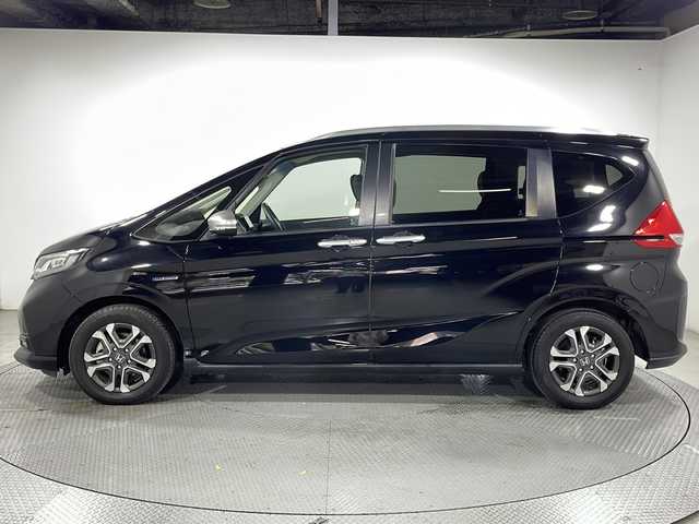 ホンダ フリード ハイブリット クロスター ホンダセンシング 広島県 2021(令3)年 3.6万km クリスタルブラックパール 禁煙車/カロッツェリアナビ/バックカメラ/レーダークルーズコントロール/両側パワースライドドア/ＥＴＣ/レーンキープアシスト/ステアリングスイッチ/衝突被害軽減システム/ＬＥＤヘッドライト/フォグ/オートライト/ＥＣＯＮ/純正15インチアルミホイール(185/65/R15)/エアバッグ(運転席/助手席)