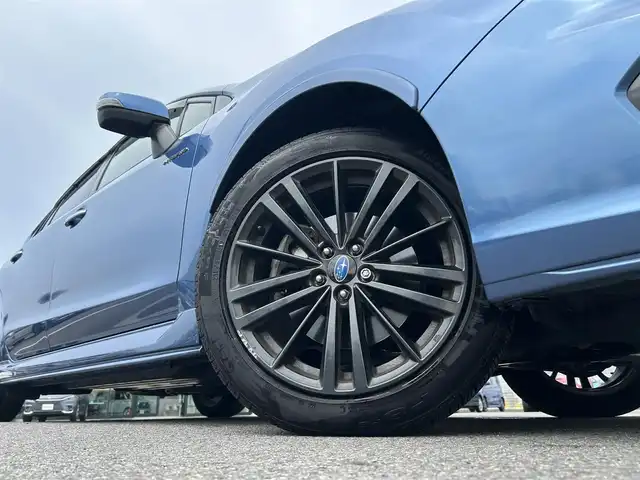 スバル インプレッサ ＸＶ ハイブリッド 愛媛県 2016(平28)年 7.1万km クォーツブルーP 登録時走行距離：70189Km/純正メモリナビ/AM/FM/DVD/CD/フルセグ/BT/4WD/ETC/AAC/ハーフレザーシート/D+Nパワーシート/追従クルーズコントロール/横滑り防止装置/盗難防止装置/レーンキープアシスト/衝突軽減システム/キセノンヘッドライト/オートライト/エンジンスタートボタン/スマートキー/純正フロアマット/純正アルミホイール