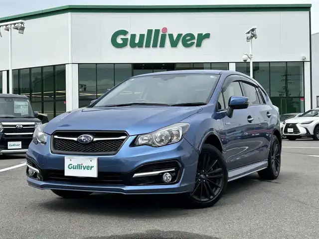 スバル インプレッサ ＸＶ ハイブリッド 愛媛県 2016(平28)年 7.1万km クォーツブルーP 登録時走行距離：70189Km/純正メモリナビ/AM/FM/DVD/CD/フルセグ/BT/4WD/ETC/AAC/ハーフレザーシート/D+Nパワーシート/追従クルーズコントロール/横滑り防止装置/盗難防止装置/レーンキープアシスト/衝突軽減システム/キセノンヘッドライト/オートライト/エンジンスタートボタン/スマートキー/純正フロアマット/純正アルミホイール