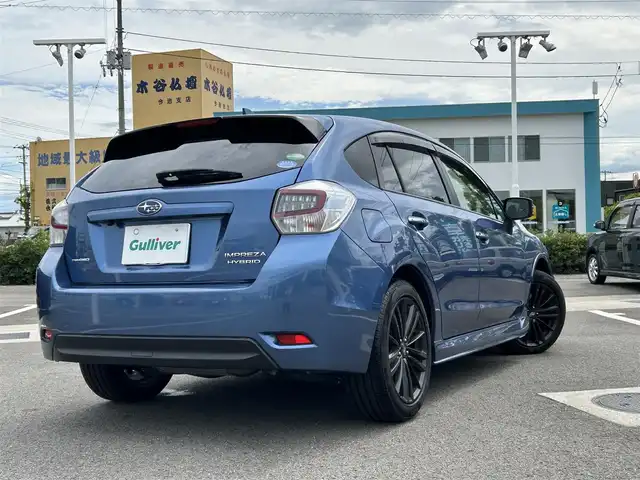スバル インプレッサ ＸＶ ハイブリッド 愛媛県 2016(平28)年 7.1万km クォーツブルーP 登録時走行距離：70189Km/純正メモリナビ/AM/FM/DVD/CD/フルセグ/BT/4WD/ETC/AAC/ハーフレザーシート/D+Nパワーシート/追従クルーズコントロール/横滑り防止装置/盗難防止装置/レーンキープアシスト/衝突軽減システム/キセノンヘッドライト/オートライト/エンジンスタートボタン/スマートキー/純正フロアマット/純正アルミホイール