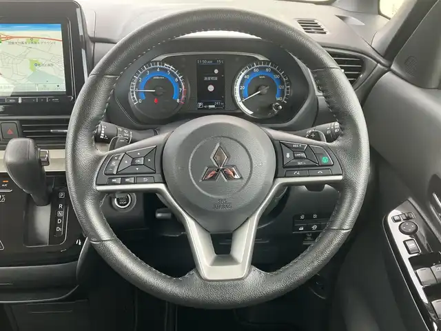 三菱 デリカミニ T プレミアム 道南・函館 2023(令5)年 0.1万km アメジストブラック/レッドM /2インチリフトアップ//社外ＳＤナビ//フルセグＴＶ//ドライブレコーダー//全周位カメラ//両側パワースライドドア//ルーフラック//デジタルインナーミラー//クルーズコントロール//レーンキープアシスト//コーナーセンサー//車線逸脱警報//オートライト//オートハイビーム//シートヒーター//合皮シートカバー//ETC//スマートキー