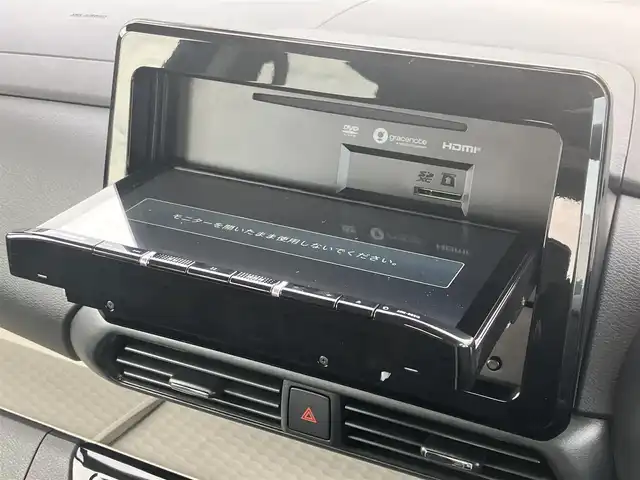 三菱 デリカミニ T プレミアム 道南・函館 2023(令5)年 0.1万km アメジストブラック/レッドM /2インチリフトアップ//社外ＳＤナビ//フルセグＴＶ//ドライブレコーダー//全周位カメラ//両側パワースライドドア//ルーフラック//デジタルインナーミラー//クルーズコントロール//レーンキープアシスト//コーナーセンサー//車線逸脱警報//オートライト//オートハイビーム//シートヒーター//合皮シートカバー//ETC//スマートキー