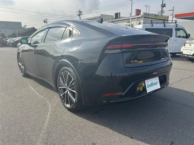 トヨタ プリウス Z 岡山県 2023(令5)年 7.5万km 黒 登録時走行距離74717km/調光パノラマルーフ/純正12.3ディスプレイオーディオ/（AM/FM/TV/BT/MiraCast/HDMI）/パノラミックビューモニター/D/N席シートヒーター/D/N席ベンチレーション/D席パワーシート/メモリーシート/トヨタセーフティセンス/・アダプティブクルーズコントロール/・レーンディパーチャアラート/・オートマチックハイビーム/・クリアランスソナー/・ブラインドスポットモニター/AC100V/ワイヤレス充電/D席メモリーシート/ステアリングヒーター/電子パーキングシステム/ビルトインETC2.0/デジタルインナーミラー/サブウーファー/純正19インチアルミホイール