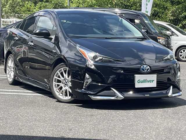 トヨタ プリウス A プレミアム　ツーリングセレ 長崎県 2018(平30)年 8.2万km アティチュードブラックマイカ 純正SDナビ（フルセグ、CD/AM/FM/BTオーディオ）/バックカメラ/ステアリングリモコン/プッシュスタート/クルーズコントロール/横滑り防止装置/レーンキープアシスト/モデリスタエアロ/BBSホイール/D席パワーシート/ビルトインETC/シートヒーター（DN席）/オートライト/オートハイビーム/センターコンソール/取扱説明書/保証書