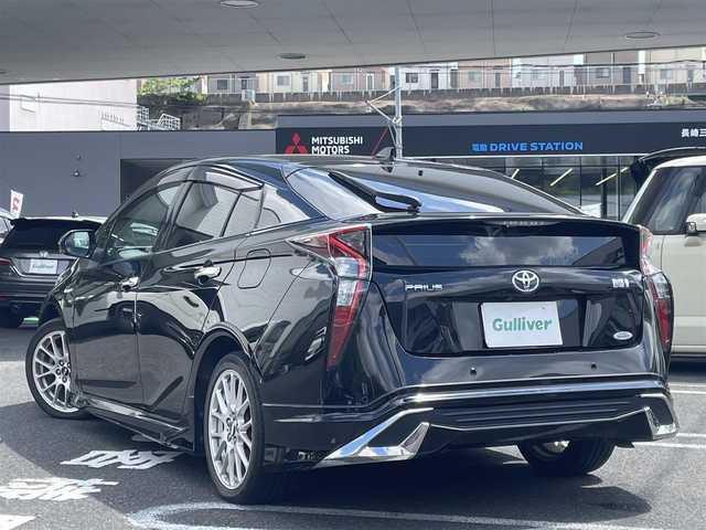 トヨタ プリウス A プレミアム　ツーリングセレ 長崎県 2018(平30)年 8.2万km アティチュードブラックマイカ 純正SDナビ（フルセグ、CD/AM/FM/BTオーディオ）/バックカメラ/ステアリングリモコン/プッシュスタート/クルーズコントロール/横滑り防止装置/レーンキープアシスト/モデリスタエアロ/BBSホイール/D席パワーシート/ビルトインETC/シートヒーター（DN席）/オートライト/オートハイビーム/センターコンソール/取扱説明書/保証書