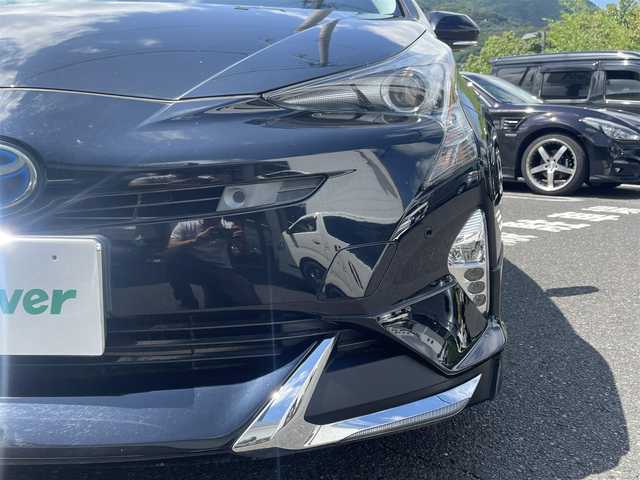 トヨタ プリウス A プレミアム　ツーリングセレ 長崎県 2018(平30)年 8.2万km アティチュードブラックマイカ 純正SDナビ（フルセグ、CD/AM/FM/BTオーディオ）/バックカメラ/ステアリングリモコン/プッシュスタート/クルーズコントロール/横滑り防止装置/レーンキープアシスト/モデリスタエアロ/BBSホイール/D席パワーシート/ビルトインETC/シートヒーター（DN席）/オートライト/オートハイビーム/センターコンソール/取扱説明書/保証書