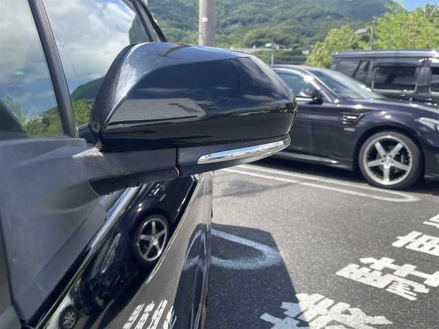 トヨタ プリウス A プレミアム　ツーリングセレ 長崎県 2018(平30)年 8.2万km アティチュードブラックマイカ 純正SDナビ（フルセグ、CD/AM/FM/BTオーディオ）/バックカメラ/ステアリングリモコン/プッシュスタート/クルーズコントロール/横滑り防止装置/レーンキープアシスト/モデリスタエアロ/BBSホイール/D席パワーシート/ビルトインETC/シートヒーター（DN席）/オートライト/オートハイビーム/センターコンソール/取扱説明書/保証書