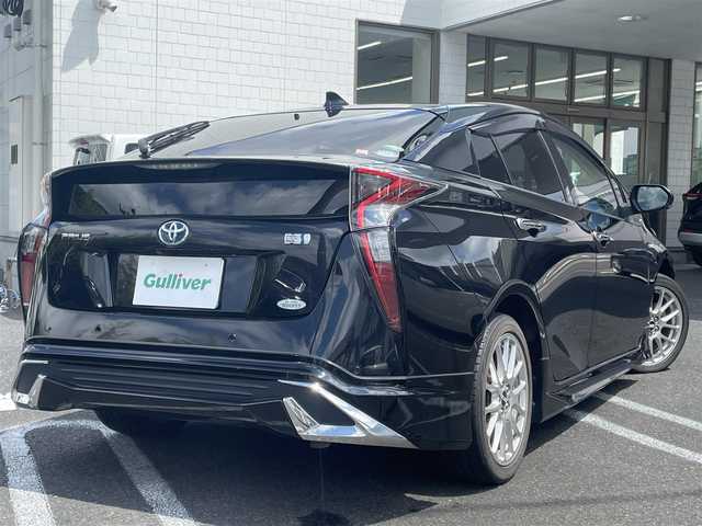 トヨタ プリウス A プレミアム　ツーリングセレ 長崎県 2018(平30)年 8.2万km アティチュードブラックマイカ 純正SDナビ（フルセグ、CD/AM/FM/BTオーディオ）/バックカメラ/ステアリングリモコン/プッシュスタート/クルーズコントロール/横滑り防止装置/レーンキープアシスト/モデリスタエアロ/BBSホイール/D席パワーシート/ビルトインETC/シートヒーター（DN席）/オートライト/オートハイビーム/センターコンソール/取扱説明書/保証書
