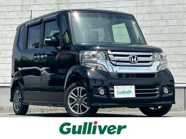 ホンダ Ｎ ＢＯＸ カスタム SSパッケージ 山形県 2015(平27)年 7.3万km スマートブラック ４WD/純正メモリーナビ/フルセグTV/FM/AM/iPod/DVD/Bluetooth/バックカメラ/横滑り防止装置/シートヒーター/両側パワースライド/デイズチャージライト/フォグランプ/AUTOライト/純正バイザ/純正マット/リモコンキー/ダブルエアバック