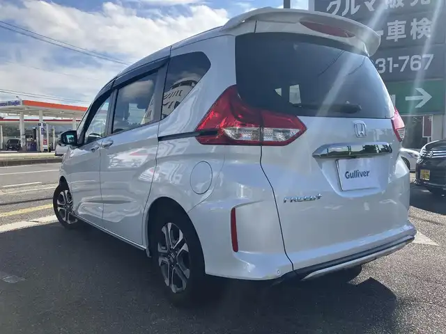 ホンダ フリード＋ クロスター ホンダセンシング 広島県 2022(令4)年 3.8万km プラチナホワイトパール ワンオーナー/ホンダセンシング/純正ナビ（VXM-227VFNi）/両側パワースライドドア/ハーフレザー調シート/フルセグTV/Bluetooth/バックガイドモニター/レーダークルーズ/シートヒーター（運転席・助手席）/ルーフレール/LEDオートライト/新車保証書/取扱説明書/スペアキー