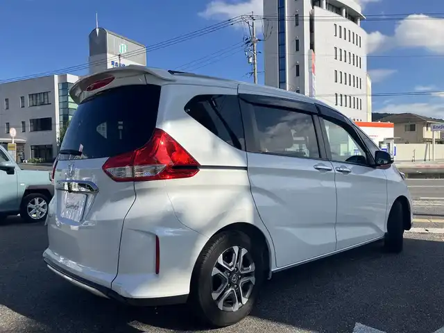 ホンダ フリード＋ クロスター ホンダセンシング 広島県 2022(令4)年 3.8万km プラチナホワイトパール ワンオーナー/ホンダセンシング/純正ナビ（VXM-227VFNi）/両側パワースライドドア/ハーフレザー調シート/フルセグTV/Bluetooth/バックガイドモニター/レーダークルーズ/シートヒーター（運転席・助手席）/ルーフレール/LEDオートライト/新車保証書/取扱説明書/スペアキー