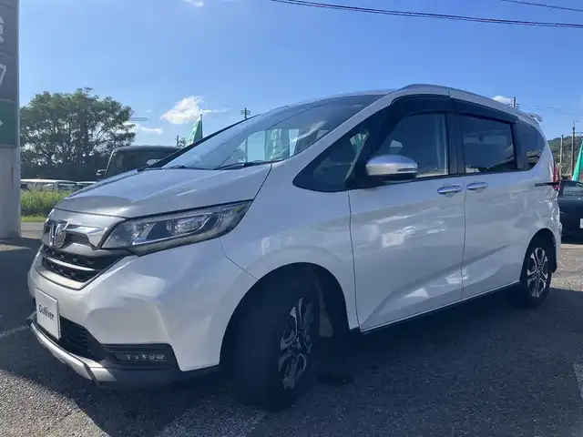 ホンダ フリード＋ クロスター ホンダセンシング 広島県 2022(令4)年 3.8万km プラチナホワイトパール ワンオーナー/ホンダセンシング/純正ナビ（VXM-227VFNi）/両側パワースライドドア/ハーフレザー調シート/フルセグTV/Bluetooth/バックガイドモニター/レーダークルーズ/シートヒーター（運転席・助手席）/ルーフレール/LEDオートライト/新車保証書/取扱説明書/スペアキー