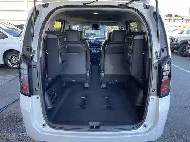 ホンダ フリード ハイブリット e:HEV AIR EX 東京都 2025(令7)年 0.1千km パール 登録済未使用車　/純正9型メモリナビフルセグ/BluetoothAudio/USB/AppleCarPlay/AndroidAuto/両パワ－スライドドア　/リアサーキュレーター/ＬＥＤヘッドライト　/ホンダセンシング　/オートハイビーム　/歩行者事故低減ステアリング　/アダプティブクルーズコントロール　/パーキングセンサ-/ブラインドスポットモニター/衝突軽減ブレーキ/誤発進抑制機能/近距離衝突軽減ブレーキ/路外逸脱抑制機能/プッシュエンジンスタート/保証書＆取説/Wエアバック＆ABS