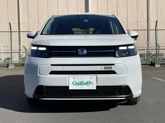 ホンダ フリード ハイブリット e:HEV AIR EX 東京都 2025(令7)年 0.1千km パール 登録済未使用車　/純正9型メモリナビフルセグ/BluetoothAudio/USB/AppleCarPlay/AndroidAuto/両パワ－スライドドア　/リアサーキュレーター/ＬＥＤヘッドライト　/ホンダセンシング　/オートハイビーム　/歩行者事故低減ステアリング　/アダプティブクルーズコントロール　/パーキングセンサ-/ブラインドスポットモニター/衝突軽減ブレーキ/誤発進抑制機能/近距離衝突軽減ブレーキ/路外逸脱抑制機能/プッシュエンジンスタート/保証書＆取説/Wエアバック＆ABS