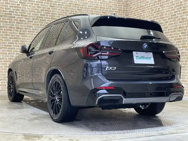 ＢＭＷ ｉＸ３ Mスポーツ 岩手県 2022(令4)年 3.9万km ソフィスト・グレー・ブリリアント・エフェクト ハーマンカードンサラウンドサウンドシステム/電動パノラマガラスサンルーフ/アダプティブサスペンション/ヘッドアップディスプレイ/ヴィーネカスレザーシート/ワイヤレスチャージング/３Dビューカメラ/ドライビングアシストプロフェッショナル/高速道路渋滞時ハンズオフアシスト/トラフィックサインアシスト/アダプティブクルーズコントロール/ステアリング＆レーンコントロールアシスト/レーンチェンジアシスト/レーンキーピングアシスト/衝突回避・被害軽減ブレーキ/ダイナミックスタビリティコントロール/パーキングアシストプラス/誤発進抑制制御/アダプティブLEDヘッドライト/ブレーキオートマチックホールド/12.3インチBMWライブコックピット/12.3インチワイドディスプレイHDDナビゲーション/AppleCarPlay/パワーシート/シートヒーター/ステアリングヒーター/純正19インチアルミホイール