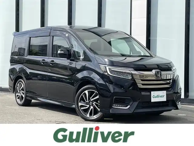 ホンダ ステップワゴン スパーダ クルスピセンシング 大阪府 2020(令2)年 3.1万km プレミアムスパークルブラックパール 純正９インチナビ/   フルセグTV/CD/DVD/Bluetooth/USB/バックモニター/衝突軽減ブレーキ/横滑り防止装置/前席シートヒーター/両側パワースライドドア/クルーズコントロール/レーンキープアシスト/ステアリングスイッチ/前後ドライブレコーダー/ハーフレザーシート/純正17インチアルミホイール/純正フロアマット/プッシュスタート/スマートキー/ＥＴＣ/ＬＥＤライト/禁煙車