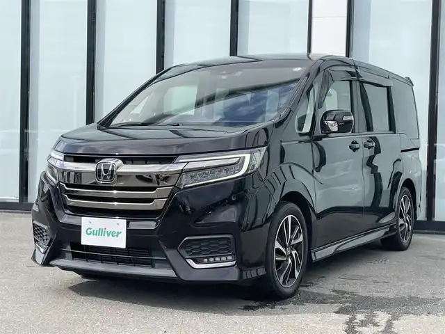 ホンダ ステップワゴン スパーダ クルスピセンシング 大阪府 2020(令2)年 3.1万km プレミアムスパークルブラックパール 純正９インチナビ/   フルセグTV/CD/DVD/Bluetooth/USB/バックモニター/衝突軽減ブレーキ/横滑り防止装置/前席シートヒーター/両側パワースライドドア/クルーズコントロール/レーンキープアシスト/ステアリングスイッチ/前後ドライブレコーダー/ハーフレザーシート/純正17インチアルミホイール/純正フロアマット/プッシュスタート/スマートキー/ＥＴＣ/ＬＥＤライト/禁煙車